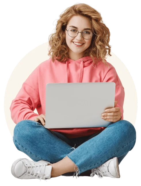 A girl sitting with a laptop